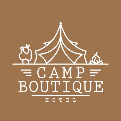 a logo for a camp bonfire hotel with a tent at Camp Boutique in Gaulverjabær