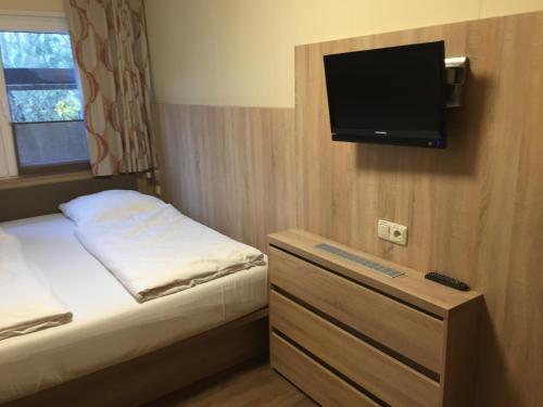 Postel nebo postele na pokoji v ubytování Schwedenhaus Wismar