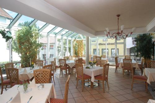 Un restaurant sau alt loc unde se poate mânca la Hotel - Landgasthof Obermaier Zum Vilserwirt