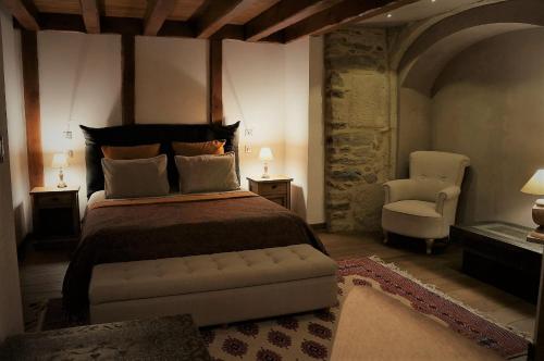 En eller flere senger på et rom på Domaine des Marequiers le Gite Aigremoine