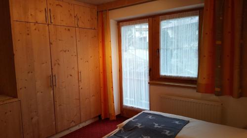 Postel nebo postele na pokoji v ubytování Haus Taxacher
