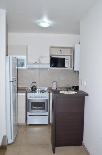Una cocina o zona de cocina en Dpto Edificio Tempo