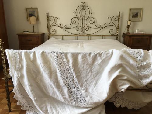 Кровать или кровати в номере BASISA Bed&Breakfast