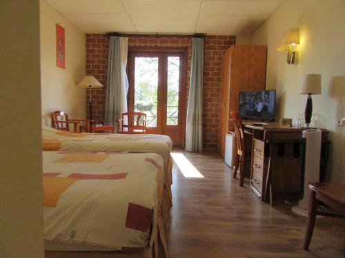 Postel nebo postele na pokoji v ubytování Hotel De Watermolen