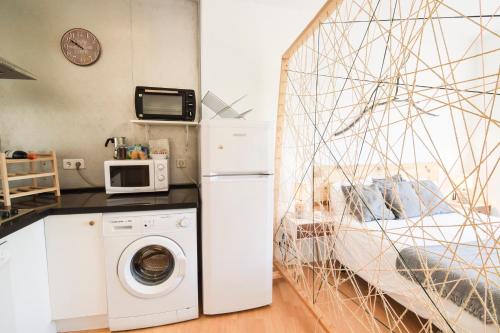 Kuchyňa alebo kuchynka v ubytovaní P&P Apartament Lagunillas I y II