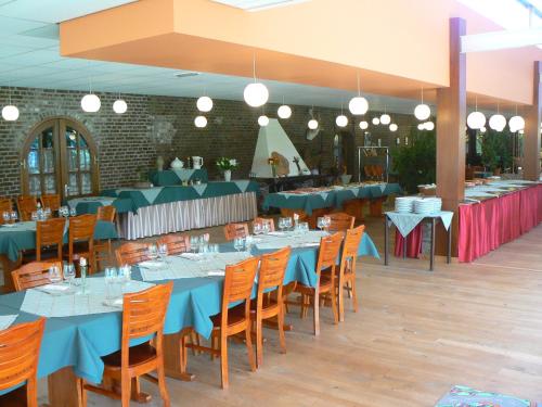 Ресторант или друго място за хранене в Hotel De Watermolen