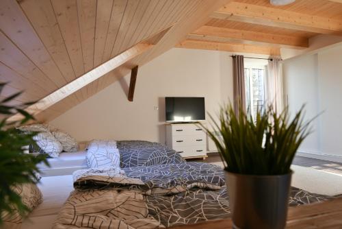 Apartmány Vízmberkにあるベッド
