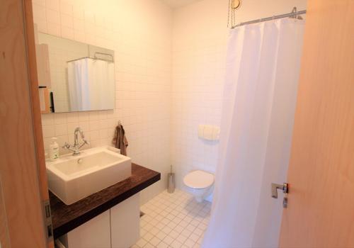 Koupelna v ubytování GreenKey Apartment - B13