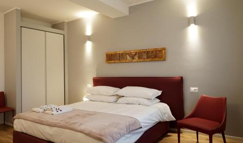 Llit o llits en una habitació de Residenza Pellacani