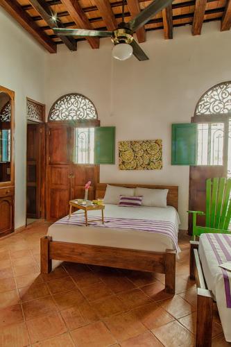 Postel nebo postele na pokoji v ubytování Casa D´Remedios La Bella Hotel Boutique