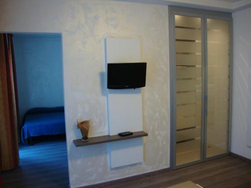 TV a/nebo společenská místnost v ubytování Hotel Venezia