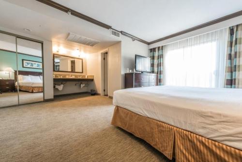 Ένα ή περισσότερα κρεβάτια σε δωμάτιο στο Vanllee Hotel