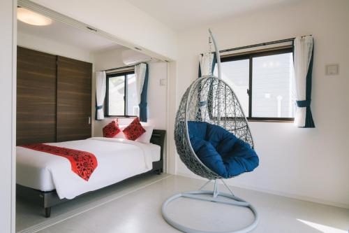 Postel nebo postele na pokoji v ubytování United Resort Sarabeth