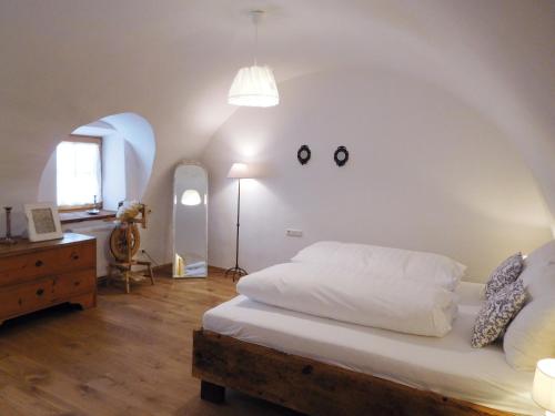 Ένα ή περισσότερα κρεβάτια σε δωμάτιο στο Appartements Kornberg Gütl
