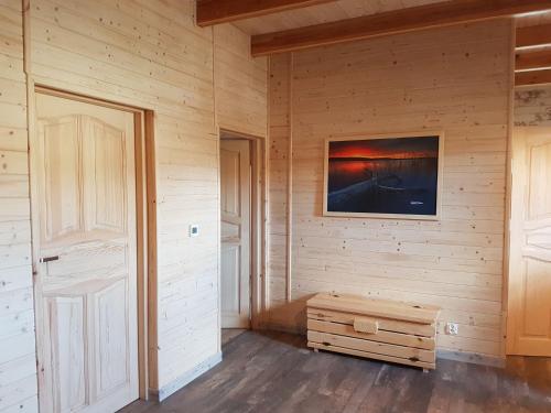 Uma televisão e/ou sistema de entretenimento em Cosy Holiday Home in Skrzynia with Terrace