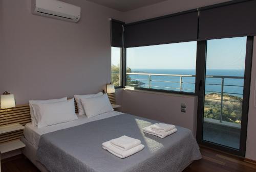 Ένα ή περισσότερα κρεβάτια σε δωμάτιο στο Villa Isidora