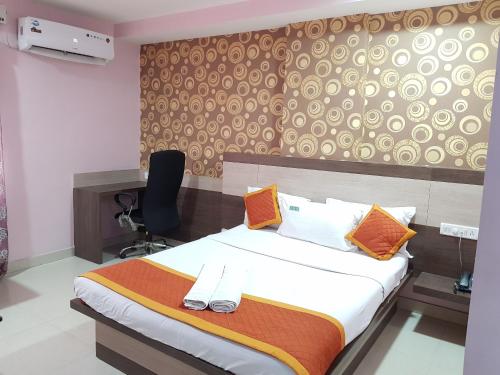 Giường trong phòng chung tại Hotel ABM International