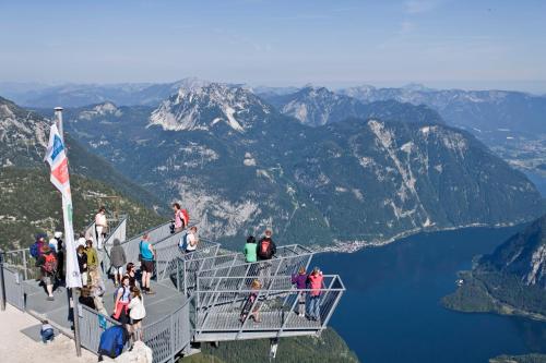 a group of people standing on top of a mountain at Gasthaus-Landhotel Traunstein in Abtenau