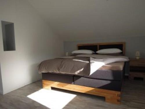 Кровать или кровати в номере Ferienwohnung Bayer