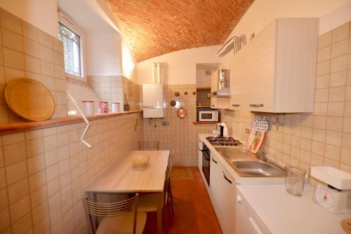 Dapur atau dapur kecil di Casa Punta Amore-WelcHome