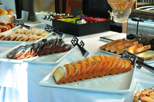 a buffet of different types of food on a table at Locanda Gli Ulivi in Monteveglio