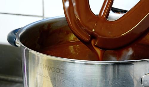a pot of chocolate sauce being being stirred at Locanda Gli Ulivi in Monteveglio