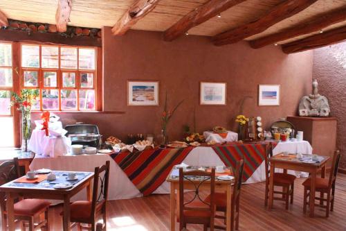 מסעדה או מקום אחר לאכול בו ב-Hotel Poblado Kimal