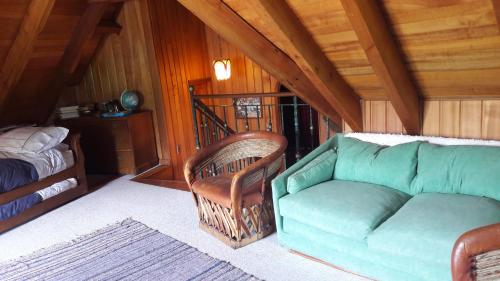 A seating area at Great Chalet Farellones