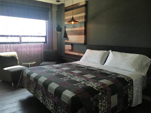Giường trong phòng chung tại Hotel La Luna
