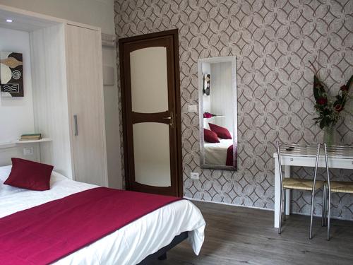 Katil atau katil-katil dalam bilik di B&B Villa Montreux