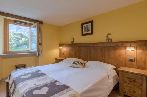Postel nebo postele na pokoji v ubytování Relais du Paradis Chambres d'Hôtes