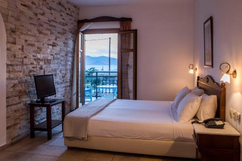 Postel nebo postele na pokoji v ubytování Plaza Beach Hotel