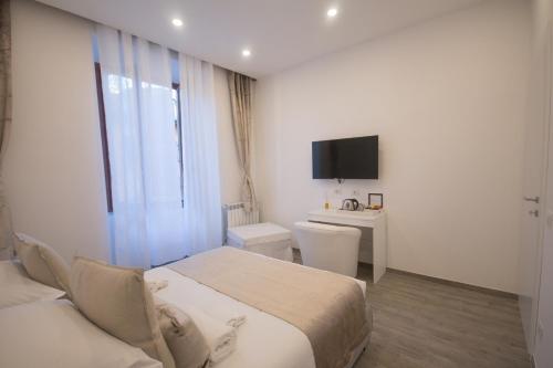 Postel nebo postele na pokoji v ubytování Trastevere Sweet Dream