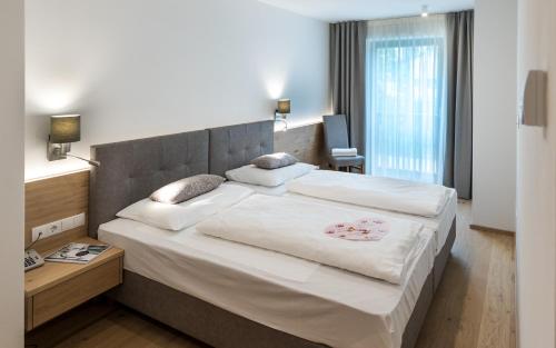 Letto o letti in una camera di Apartm. & BB Ferienidylle Gstrein