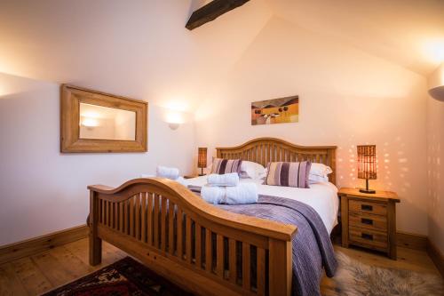 Ένα ή περισσότερα κρεβάτια σε δωμάτιο στο The Lodge