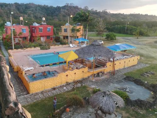 an aerial view of a resort with a swimming pool at Hosteria Mar de Plata in Cabuyal
