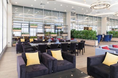 Χώρος καθιστικού στο Hm Commerce Hotel