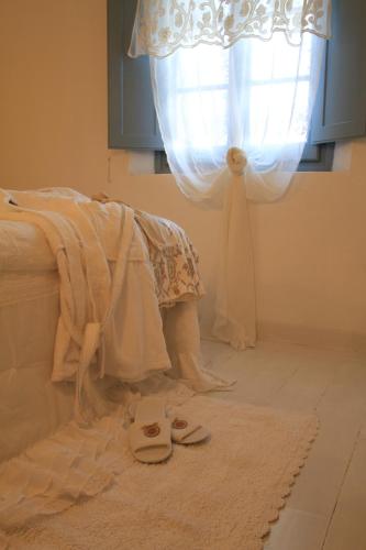 Postel nebo postele na pokoji v ubytování La Casina di Manon