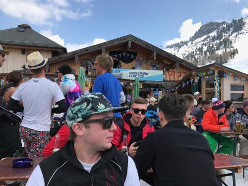 a crowd of people sitting at tables in front of a lodge at Steinlechner-Meyer Elisabeth in Stumm