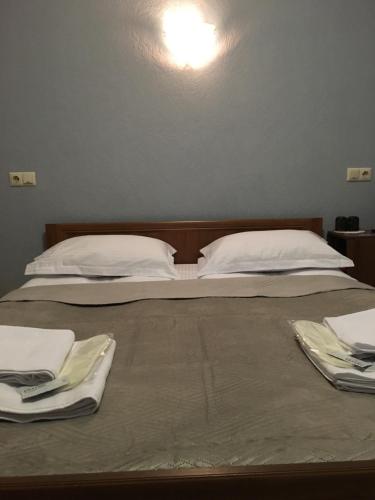 Cama o camas de una habitación en Апартаменти готельного типу