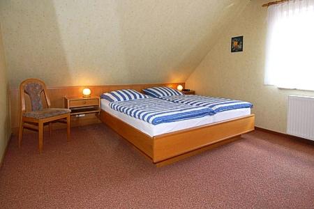 เตียงในห้องที่ Haus Andreesen