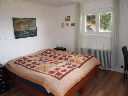 מיטה או מיטות בחדר ב-Gais Alpins