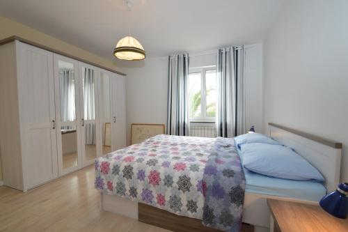 Posteľ alebo postele v izbe v ubytovaní Apartment with garden - Ana 1