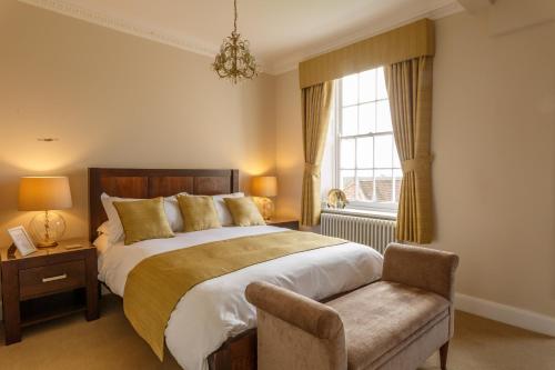 Кровать или кровати в номере B&B Downham Hall