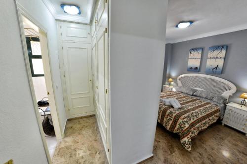 Ένα ή περισσότερα κρεβάτια σε δωμάτιο στο WonderStays Chalet El Naranjo