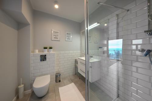 Kúpeľňa v ubytovaní Apartament Horyzont Amber