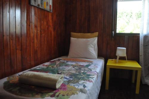 Un pat sau paturi într-o cameră la F! Lisbon Guest House