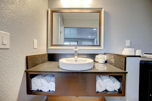 Salle de bains dans l'établissement Welcome Inn San Bernardino/ Colton