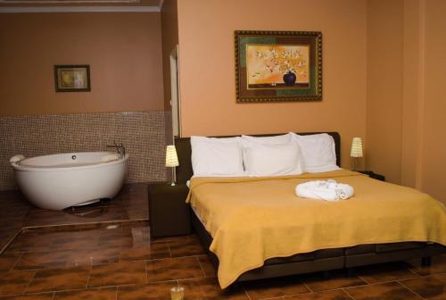Sheva Hotelにあるベッド