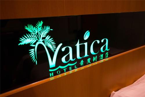 a neon sign for a villa hotel at Vatica Hefei Yaohai District Linquan Road Anhui Big Market Hotel in Hefei